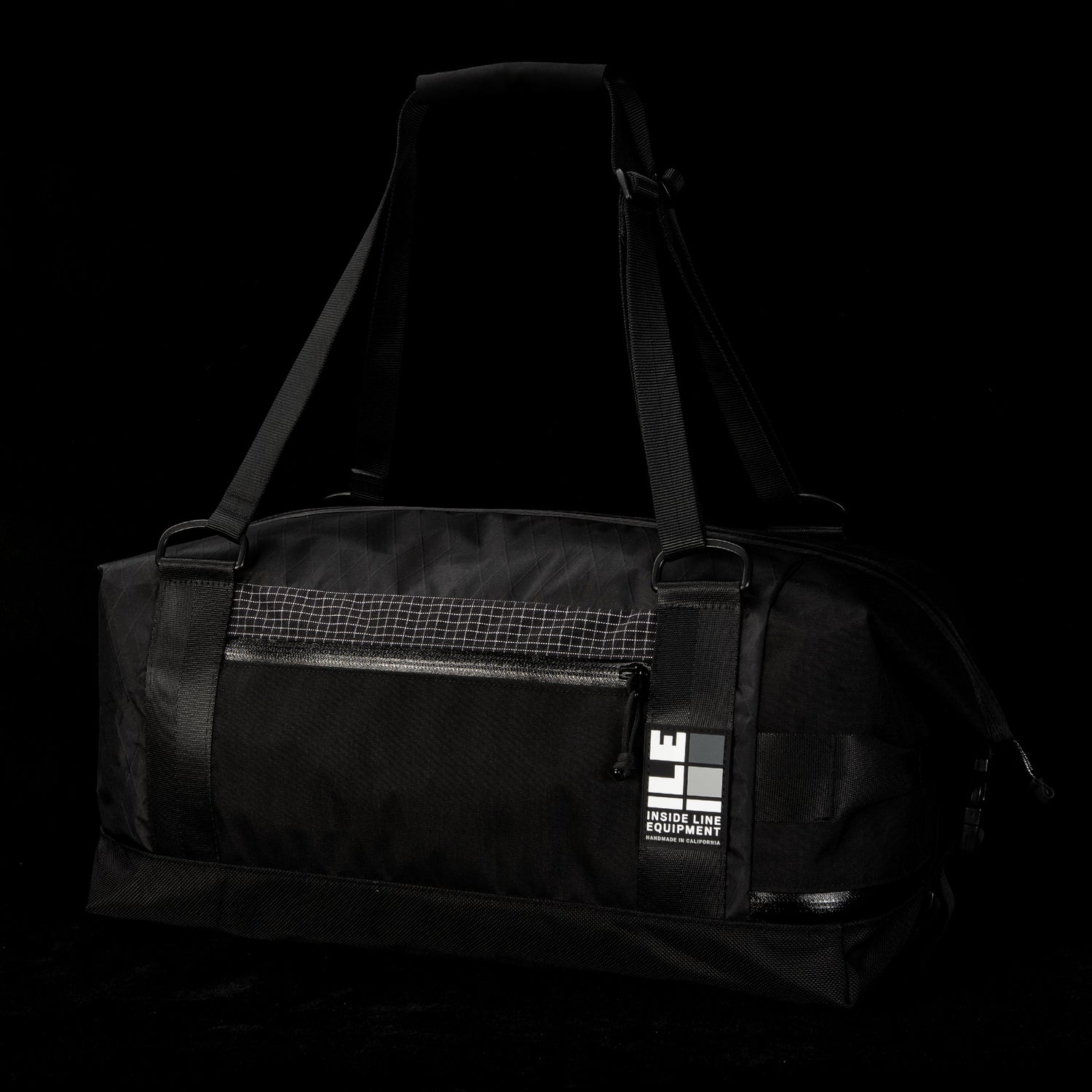 Arid Duffle 32L: Blackout Patchwork
