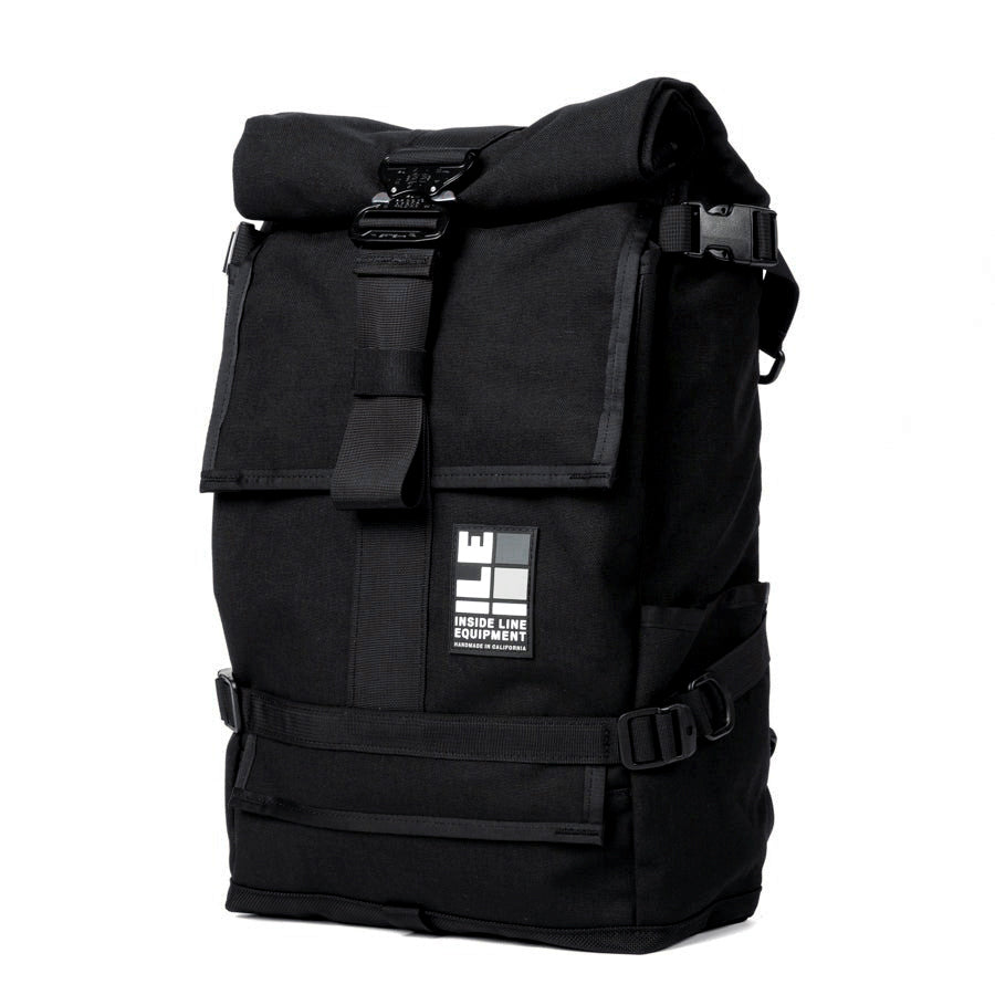inside line equipment default mini backpack Flaptop 21L Messenger Style Bike Courier Cycling Waterproof and Handmade in Berkeley, California zippered laptop sleeve is accessible under the main flap. Our signature Default backpackfeaturing a