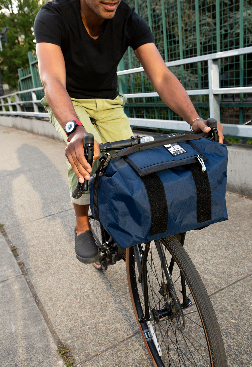 Cyclist with Rackbag on velo orange rack
